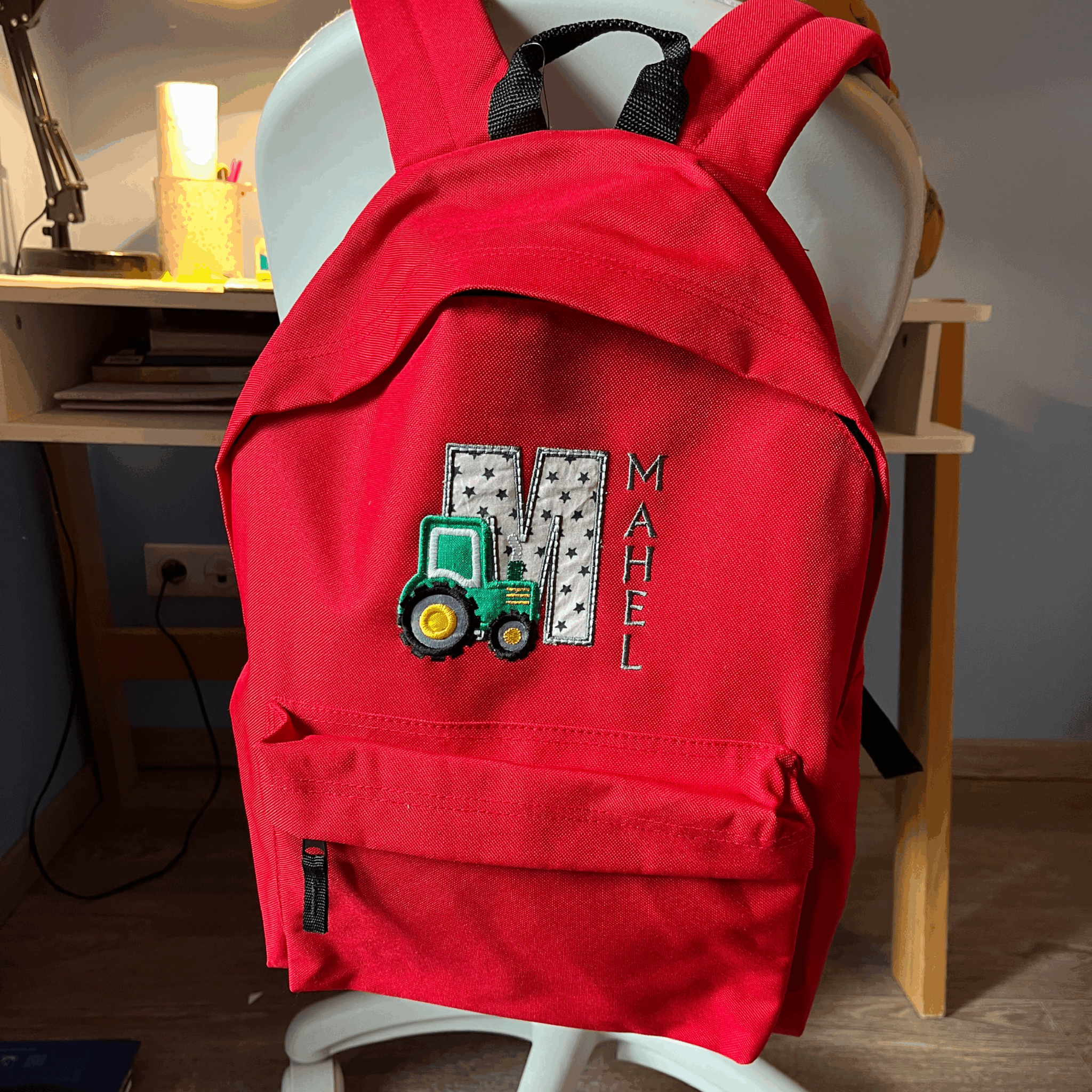 Le sac à dos de "grand" lettrine